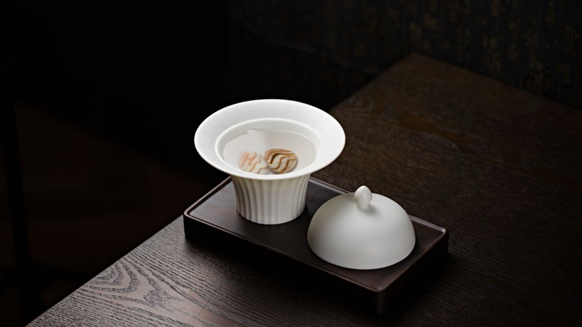 Traditional chinese dessert plate with porcelain tea cups