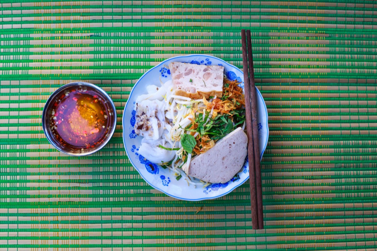 Korean rice noodles with spicy sauce in traditional kitchen